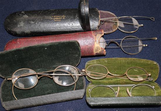 Five cased pairs of early 20th century spectacles